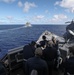 USS Dewey (DDG 105) Conducts Underway Replenishment with USNS Matthew Perry (T-AKE 9) While Operating in the Philippine Sea