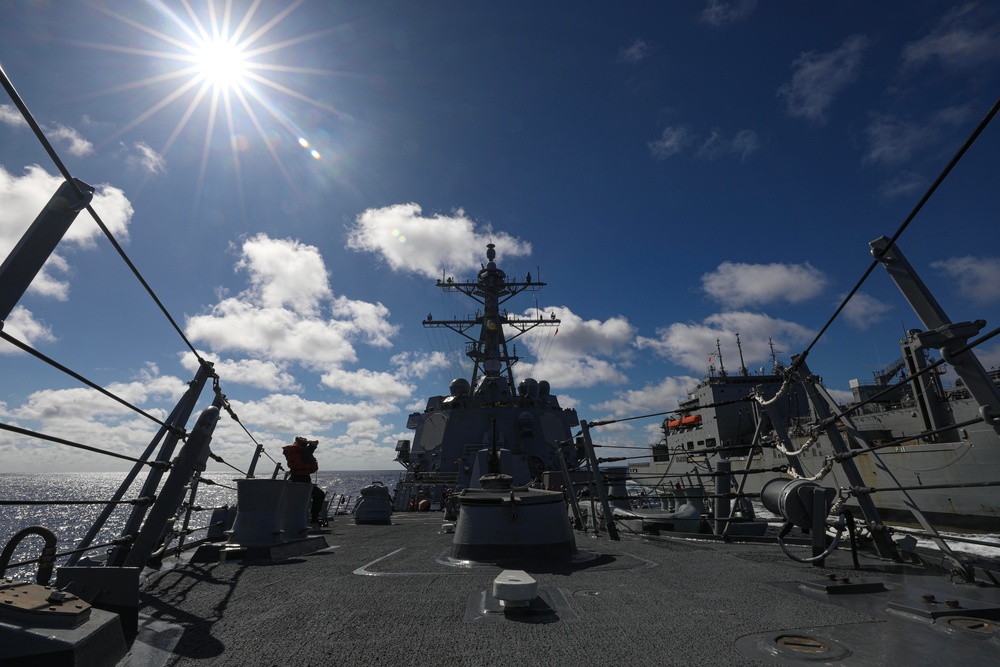 USS Dewey (DDG 105) Conducts Underway Replenishment with USNS Matthew Perry (T-AKE 9) While Operating in the Philippine Sea