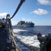 USS Dewey (DDG 105) Conducts Underway Replenishment with USNS Matthew Perry (T-AKE 9) While Operating in the Philippine Sea