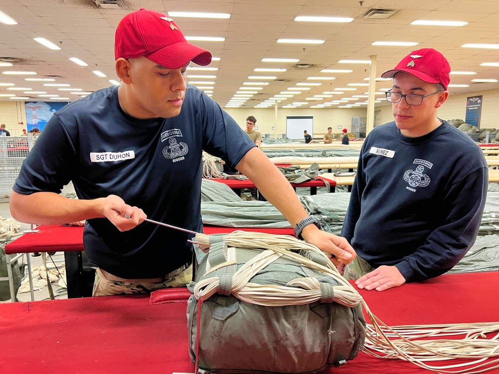 Parachute Riggers prepare for Operation Toy Drop