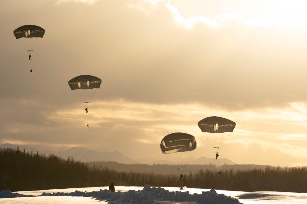 Army paratroopers and Marine Corps aviators conduct joint airborne training at JBER