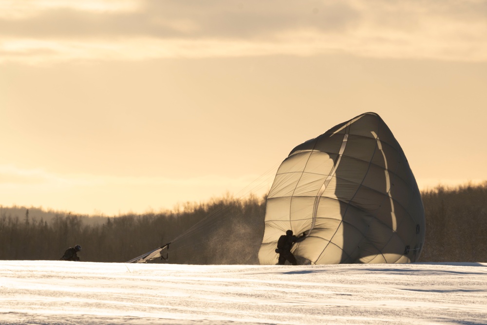 Army paratroopers and Marine Corps aviators conduct joint airborne training at JBER