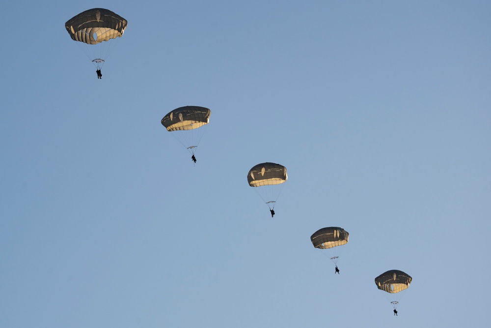 Army paratroopers and Marine Corps aviators conduct joint airborne training at JBER