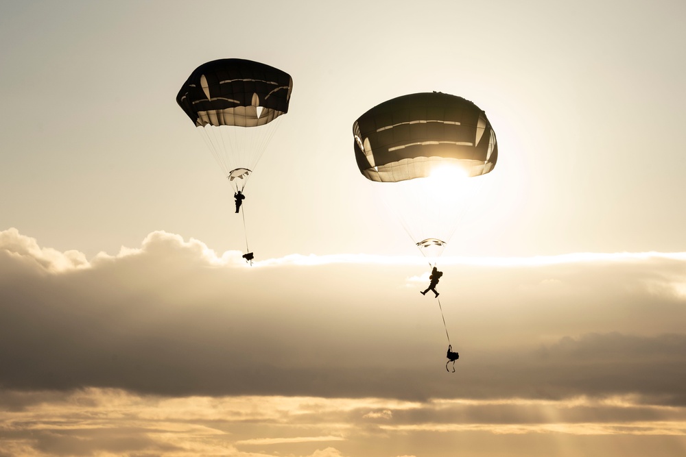 Army paratroopers and Marine Corps aviators conduct joint airborne training at JBER