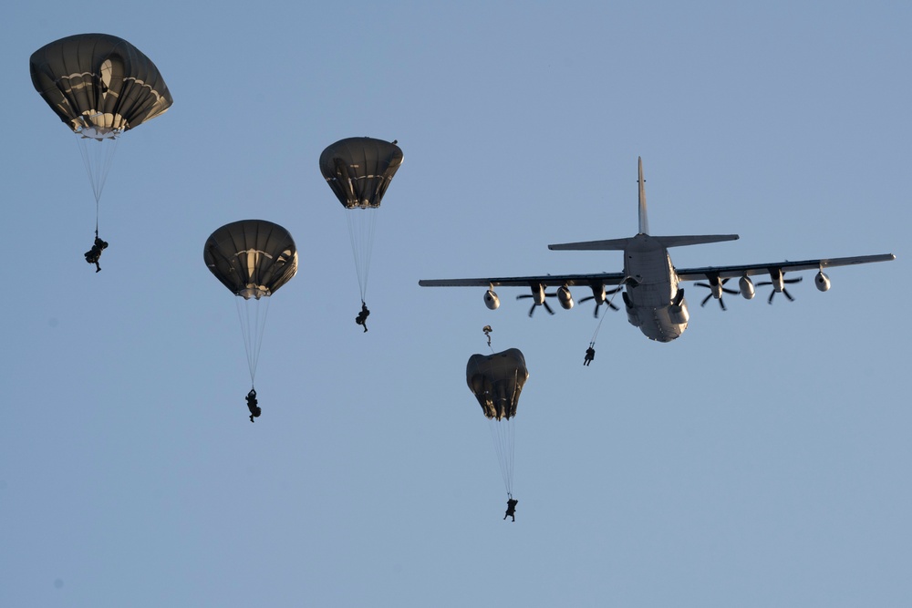 Army paratroopers and Marine Corps aviators conduct joint airborne training at JBER