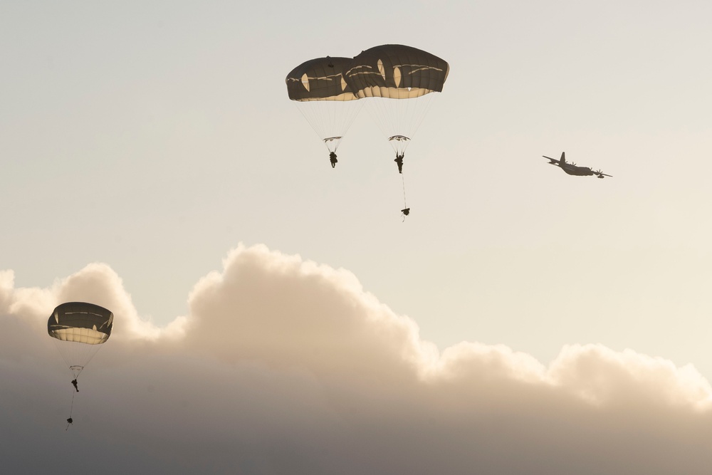 Army paratroopers and Marine Corps aviators conduct joint airborne training at JBER