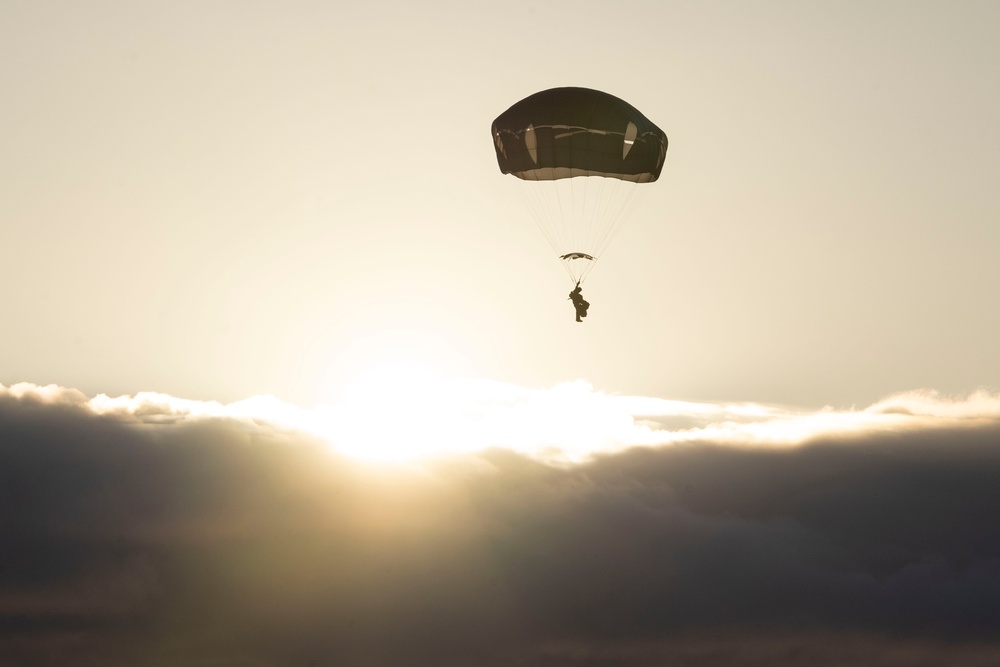 Army paratroopers and Marine Corps aviators conduct joint airborne training at JBER