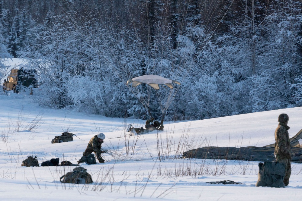 Army paratroopers and Marine Corps aviators conduct joint airborne training at JBER