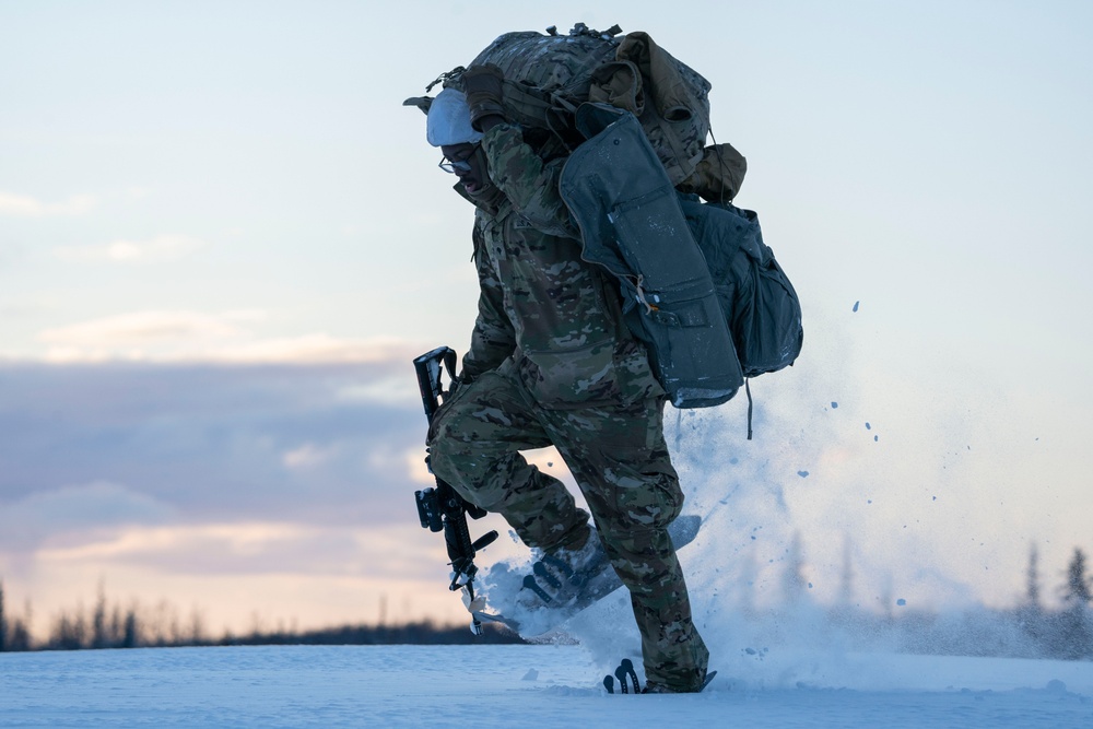 Army paratroopers and Marine Corps aviators conduct joint airborne training at JBER