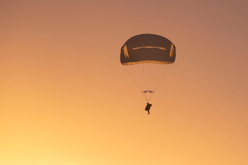 Army paratroopers and Marine Corps aviators conduct joint airborne training at JBER