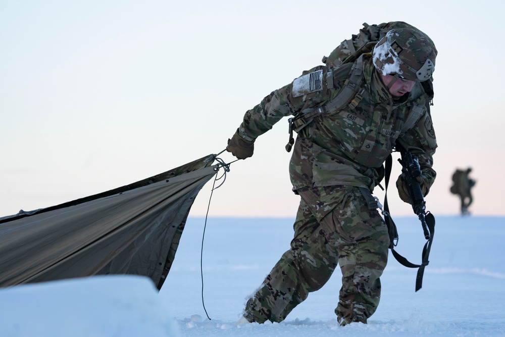 Army paratroopers and Marine Corps aviators conduct joint airborne training at JBER