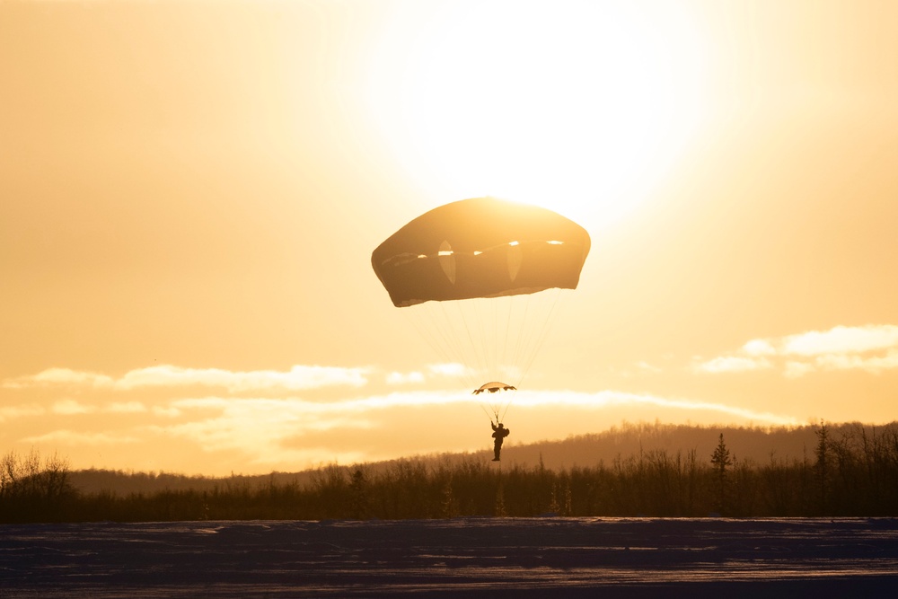 Army paratroopers and Marine Corps aviators conduct joint airborne training at JBER