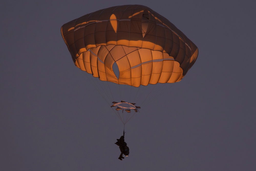 Army paratroopers and Marine Corps aviators conduct joint airborne training at JBER