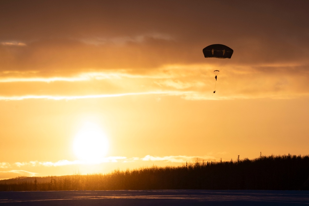 Army paratroopers and Marine Corps aviators conduct joint airborne training at JBER