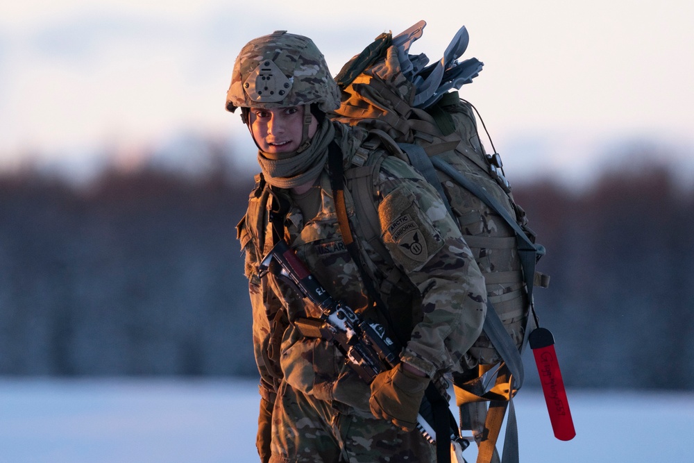 Army paratroopers and Marine Corps aviators conduct joint airborne training at JBER