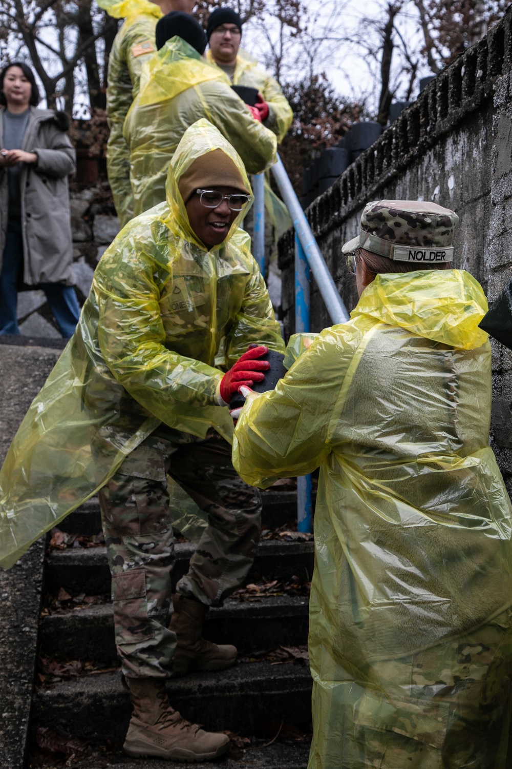 Camp Casey U.S. Soldiers deliver coal briquettes to underprivileged neighborhoods in the city of Uijeongbu