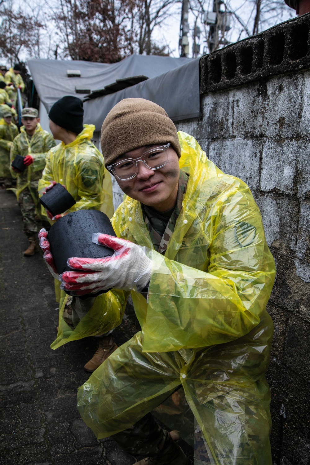 Camp Casey U.S. Soldiers deliver coal briquettes to underprivileged neighborhoods in the city of Uijeongbu