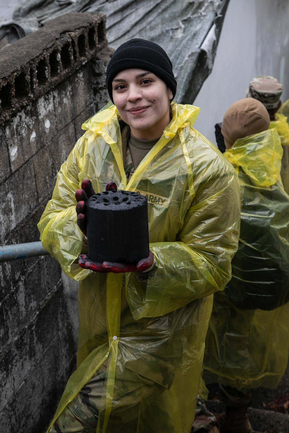 Camp Casey U.S. Soldiers deliver coal briquettes to underprivileged neighborhoods in the city of Uijeongbu