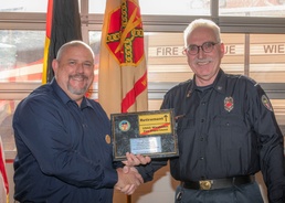 Garrison celebrates local national’s devoted firefighting career