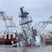 Strong enough: Coast Guardsman frees 2 trapped in sinking tugboat