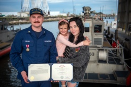 Strong enough: Coast Guardsman frees 2 trapped in sinking tugboat