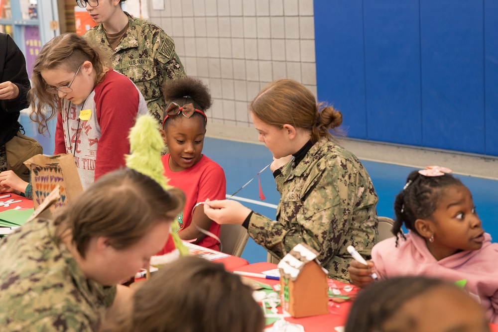 NAS Pensacola Hosts Local Schoolchildren for Holiday Event