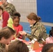 NAS Pensacola Hosts Local Schoolchildren for Holiday Event