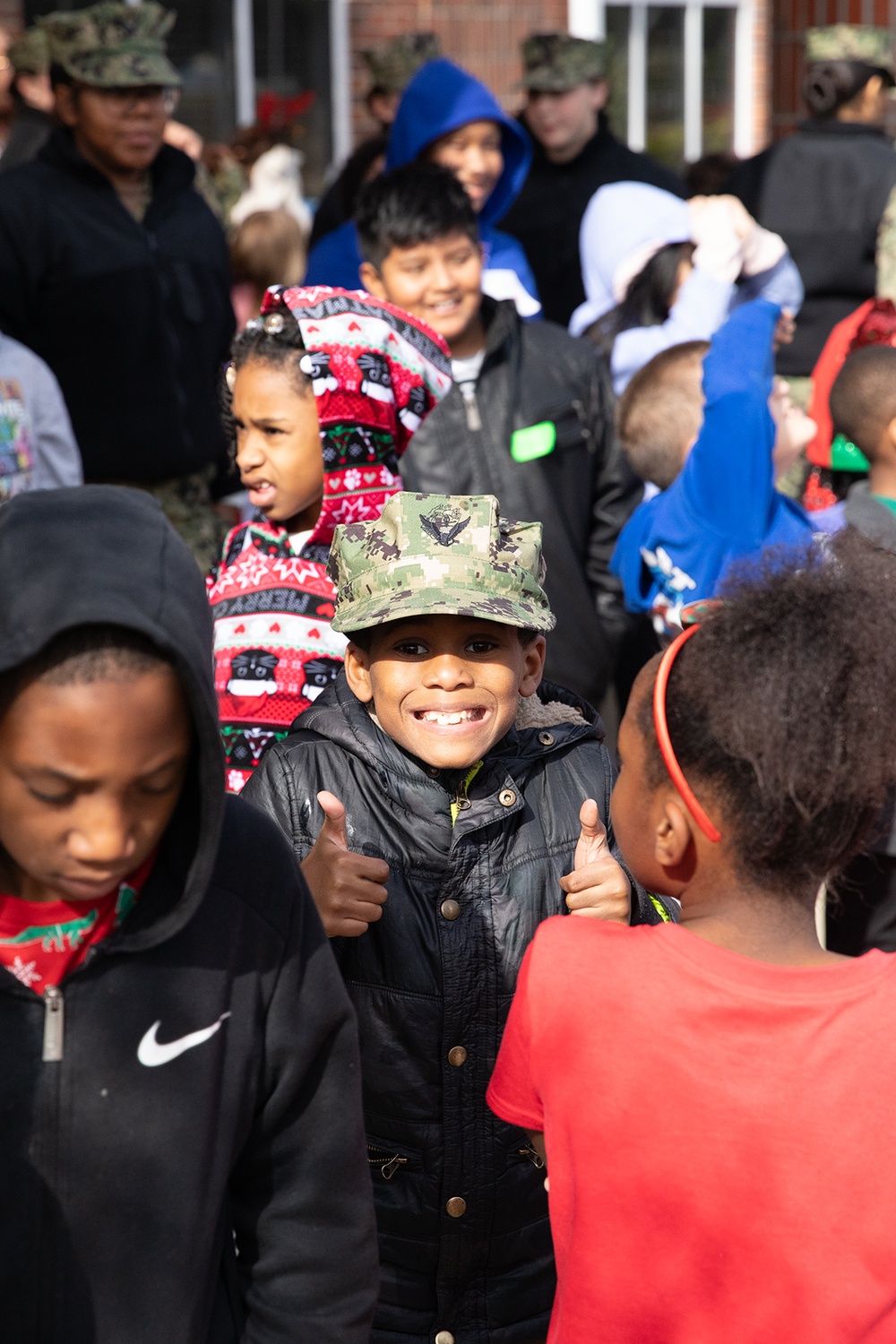 NAS Pensacola Hosts Local Schoolchildren for Holiday Event