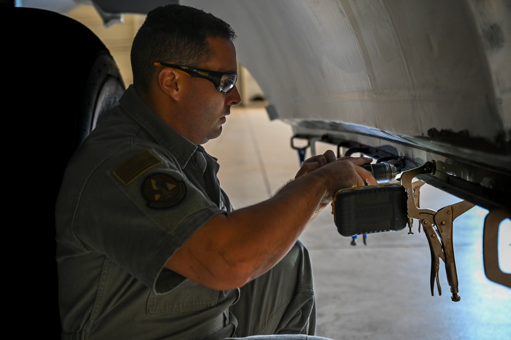 Landing gear door drill through