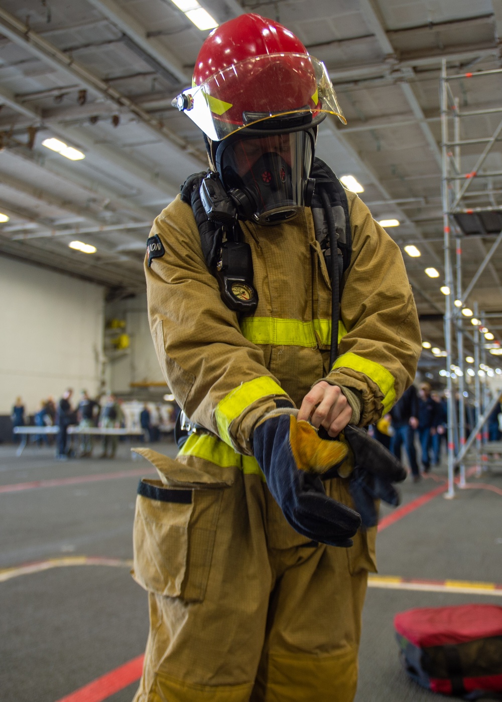 USS Ronald Reagan (CVN 76) conducts a joint damage control drill