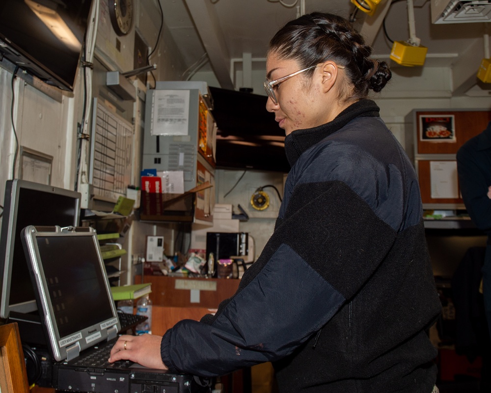 USS Ronald Reagan (CVN 76) Sailors perform maintenance
