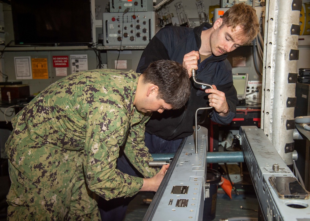 USS Ronald Reagan (CVN 76) Sailors perform maintenance