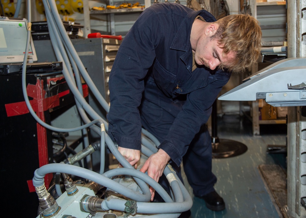 USS Ronald Reagan (CVN 76) Sailors perform maintenance