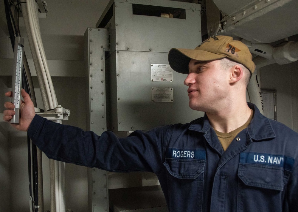 USS Ronald Reagan (CVN 76) Sailors stand Load Center Roving Watch