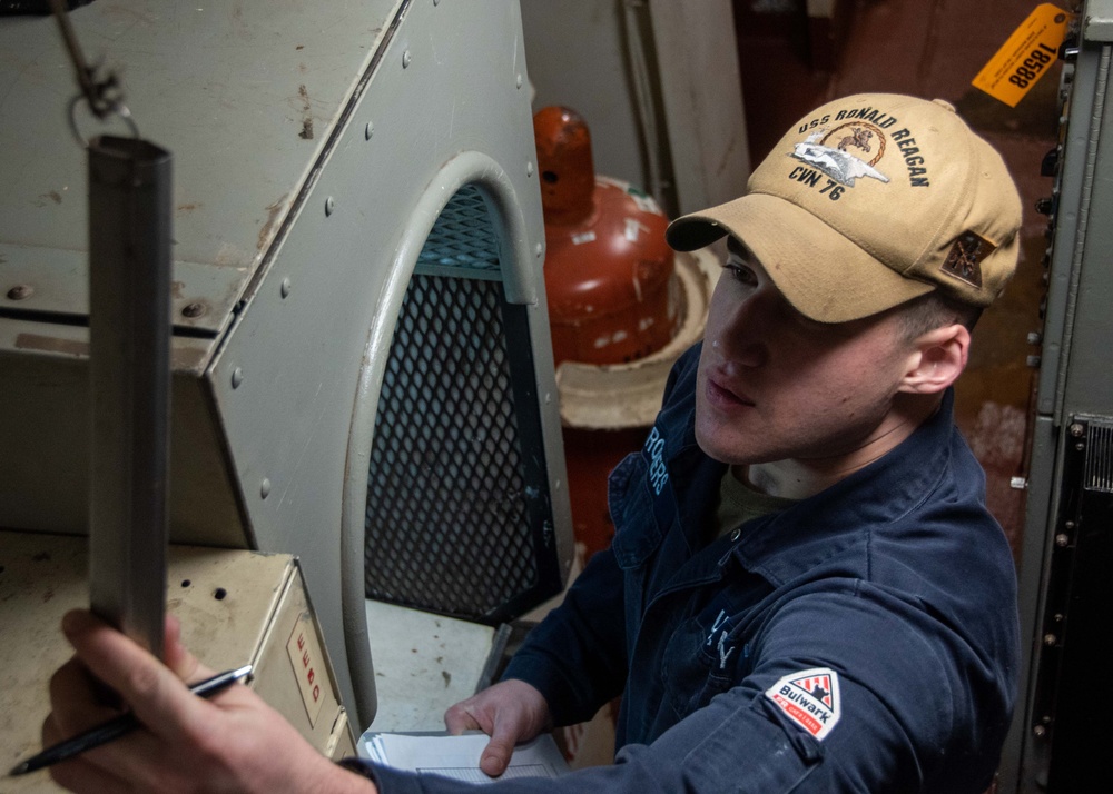 USS Ronald Reagan (CVN 76) Sailors stand Load Center Roving Watch