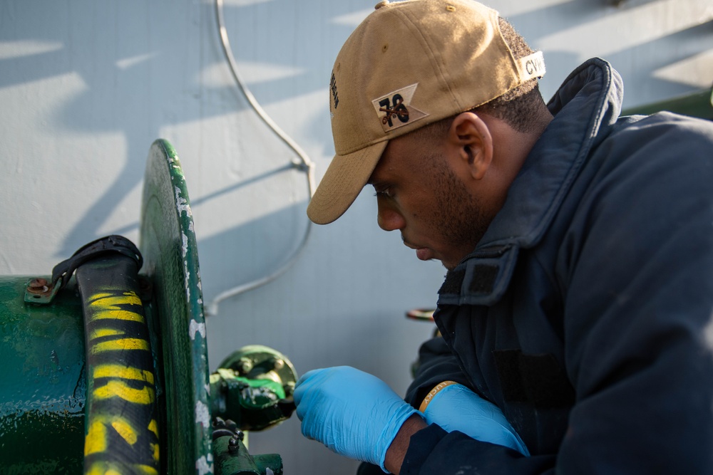 USS Ronald Reagan (CVN 76) Sailors perform daily flight deck tasks