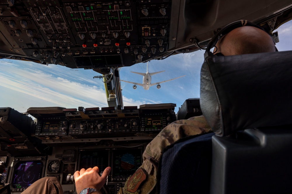 C-17 Globemaster III is refueled by KC-46A Pegasus