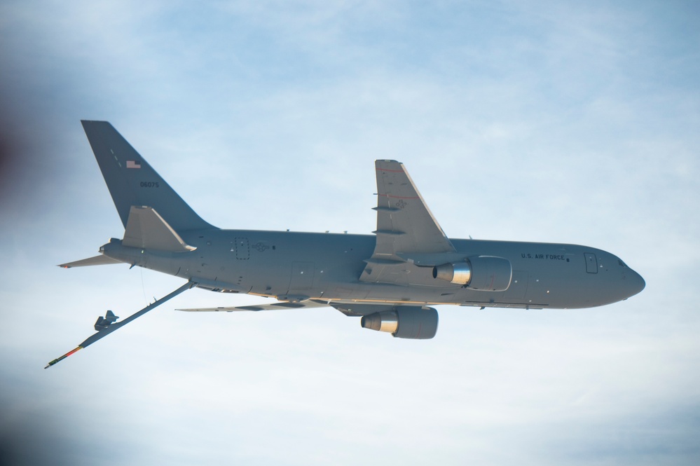 C-17 Globemaster III is refueled by KC-46A Pegasus