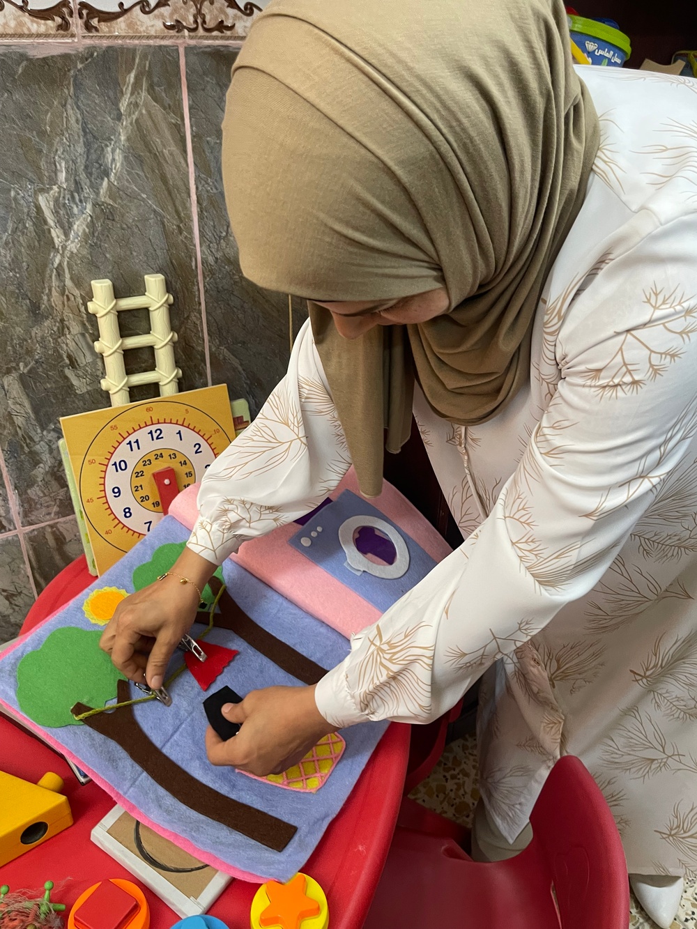 Meet Ms. Abeer, a kindergarten teacher and a talented artist.