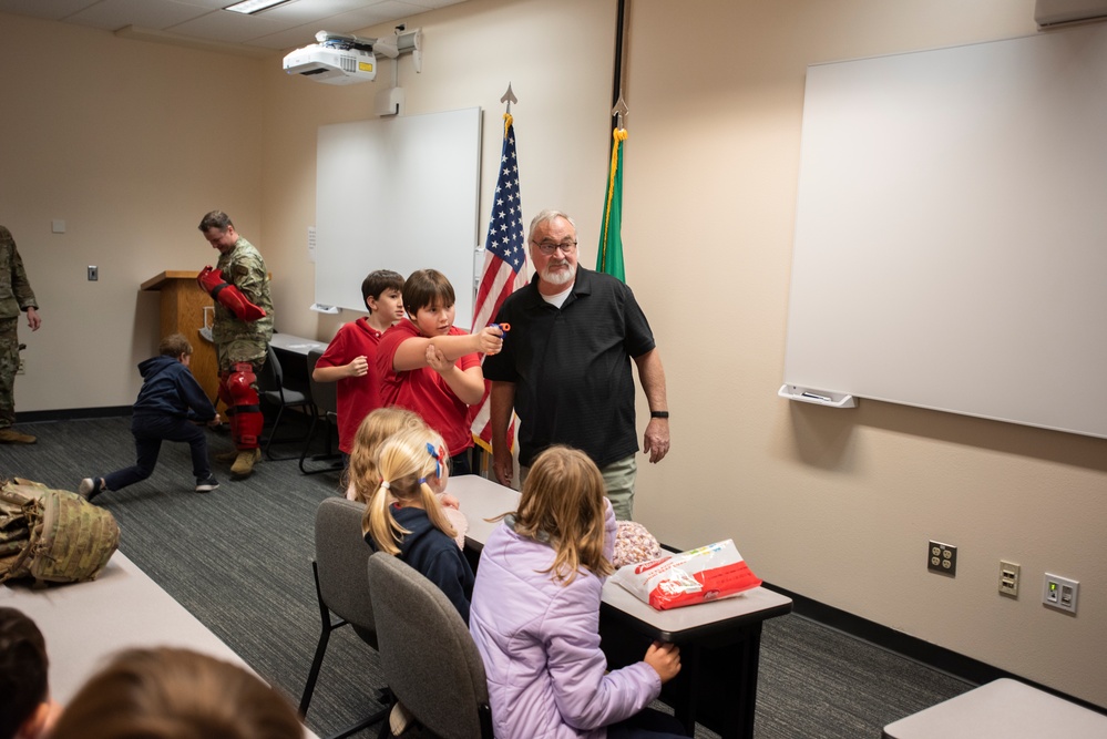 St. John Vianney first and fifth graders tour the 141st Air Refueling Wing