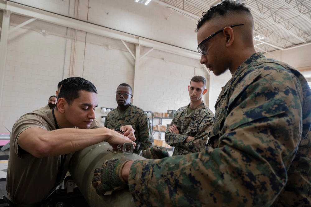Dyess Airmen and Marines build GBUs