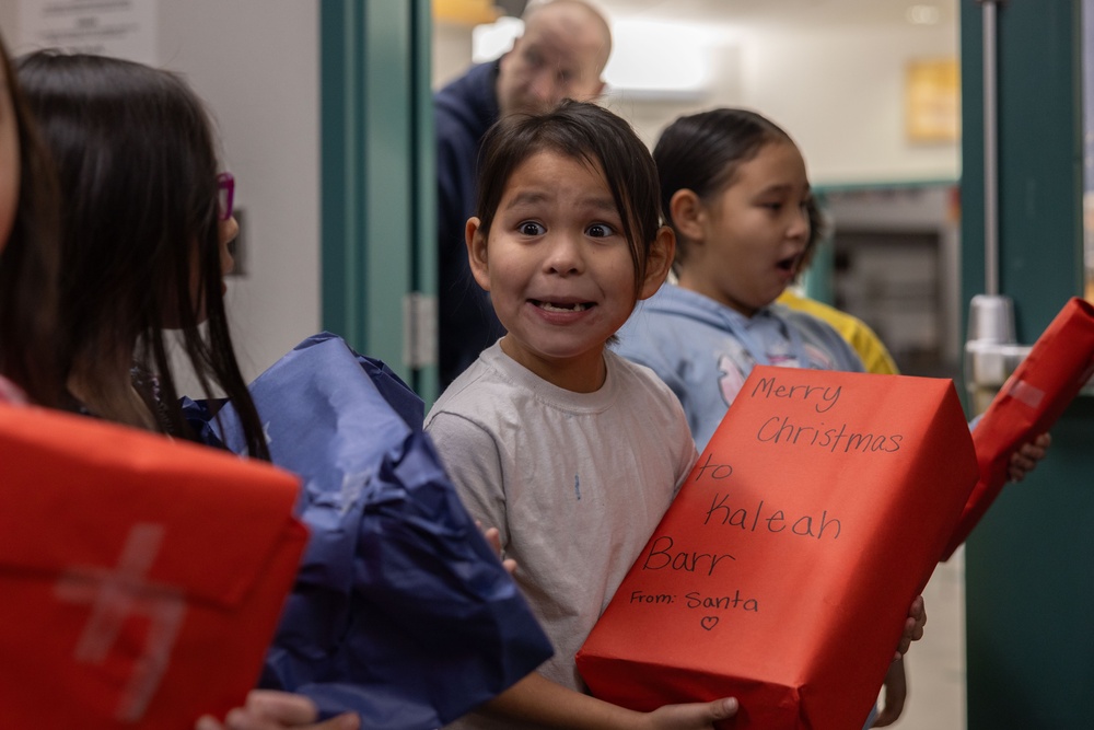 Alaska Marines deliver toys to children in remote locations