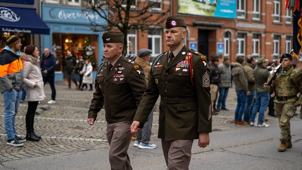 Soldiers from the 101st Airborne Division (Air Assault) march through Bastogne 2023