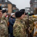 Soldiers from the 101st Airborne Division (Air Assault) march through Bastogne 2023