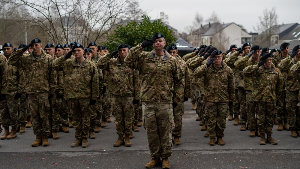 Soldiers from the 101st Airborne Division (Air Assault) march through Bastogne 2023