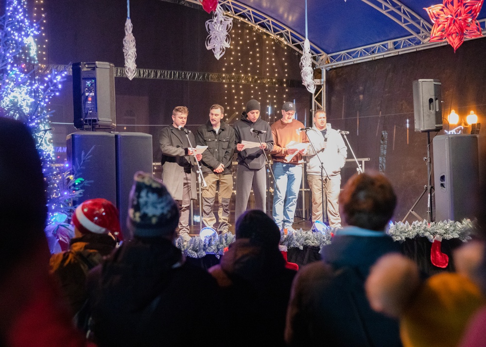 Dogface Soldiers serenade Biała Piska, Poland, with Christmas carols