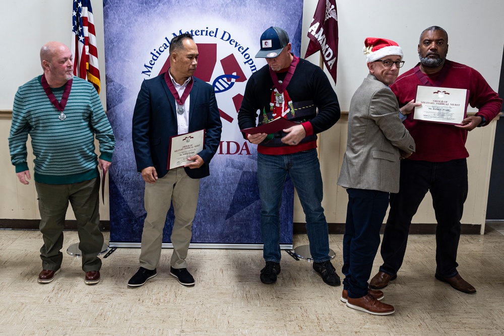 Army's premier medical products development activity team gathers for yearend Town Hall, Holiday Party