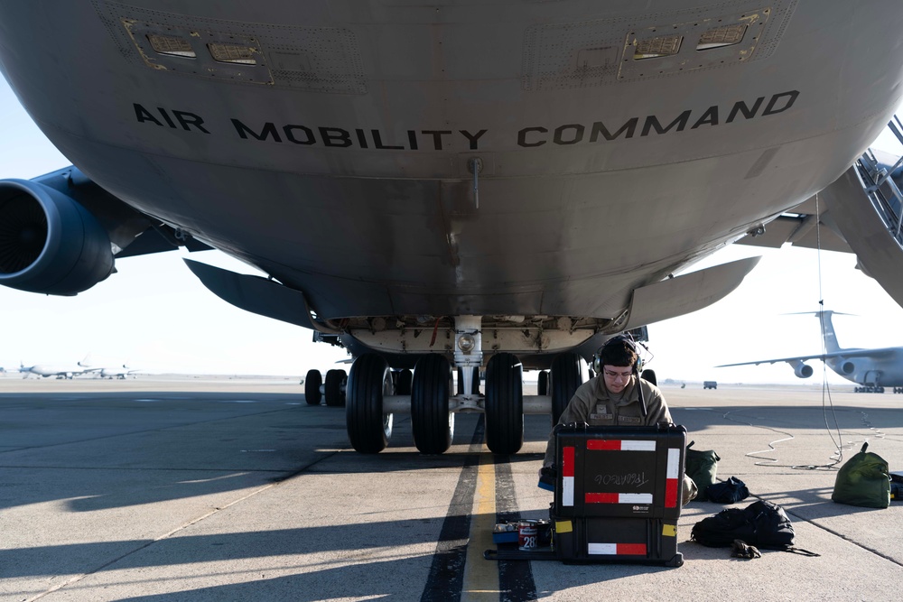 Team Travis flyers conduct reverse flow air refueling