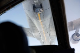Team Travis flyers conduct reverse flow air refueling