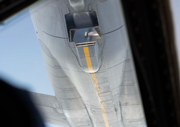 Team Travis flyers conduct reverse flow air refueling